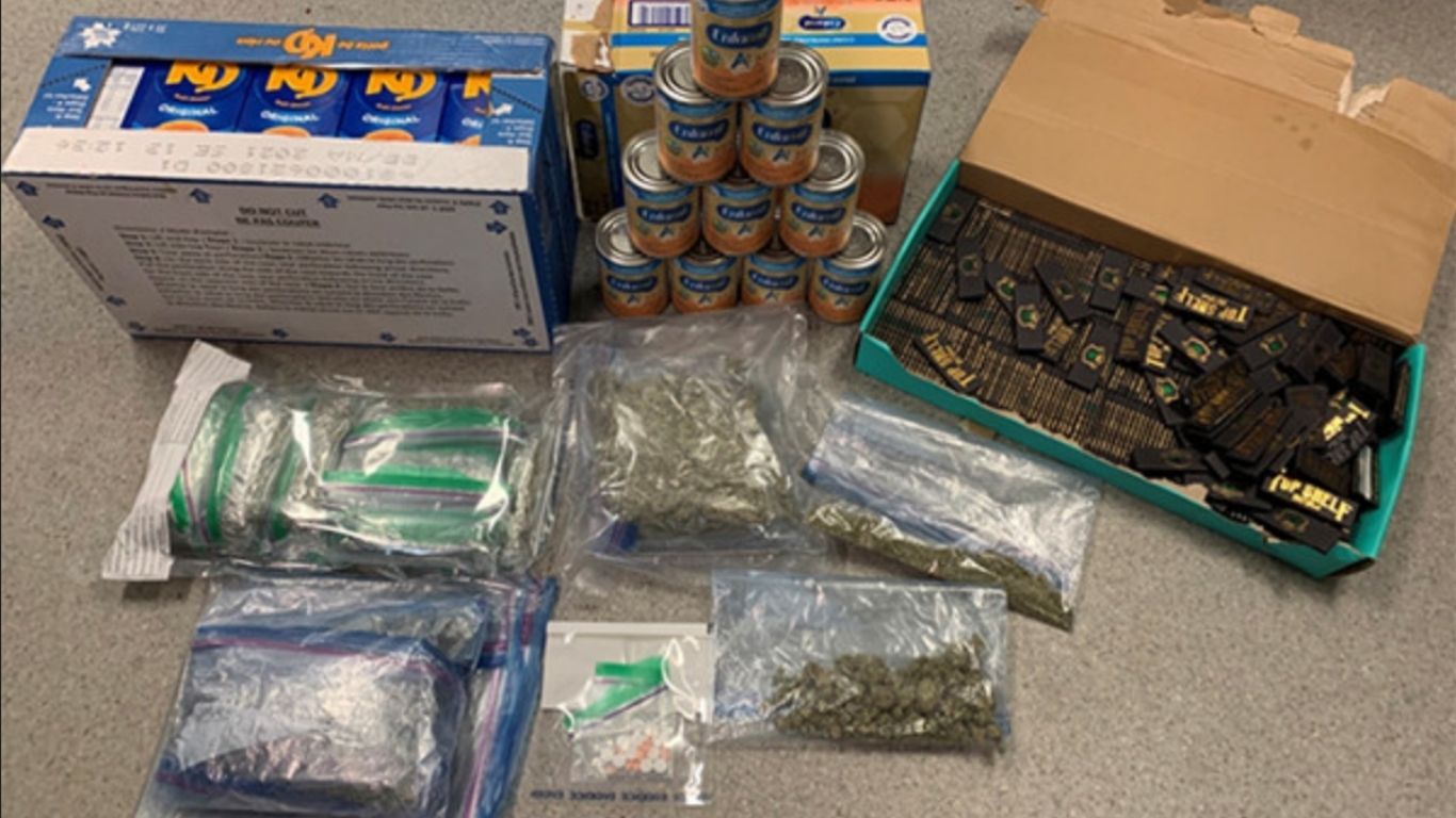 Manitoba RCMP find more than a pound of weed, other drugs and alcohol hidden inside shipment of Kraft Dinner